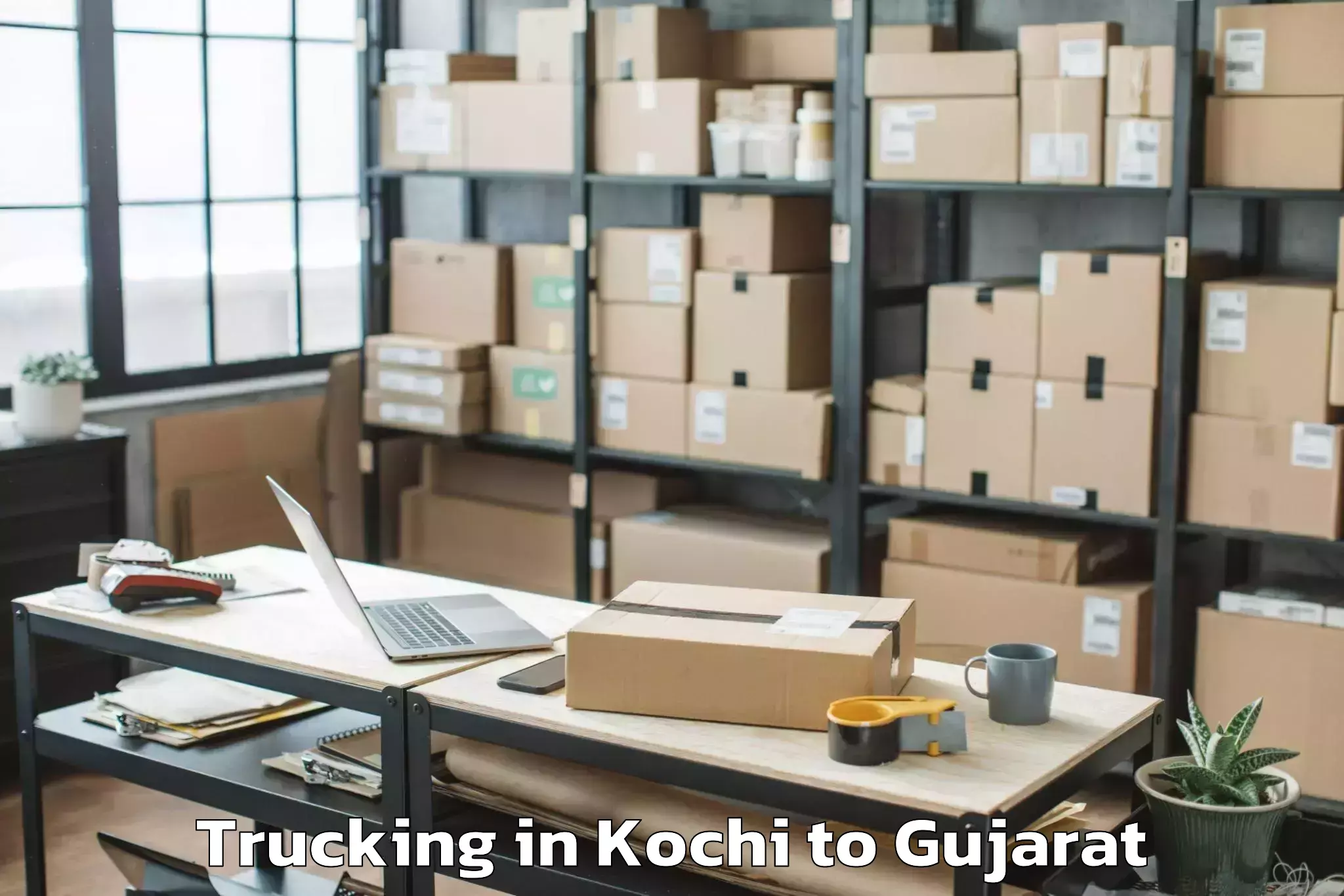 Leading Kochi to Dehgam Trucking Provider